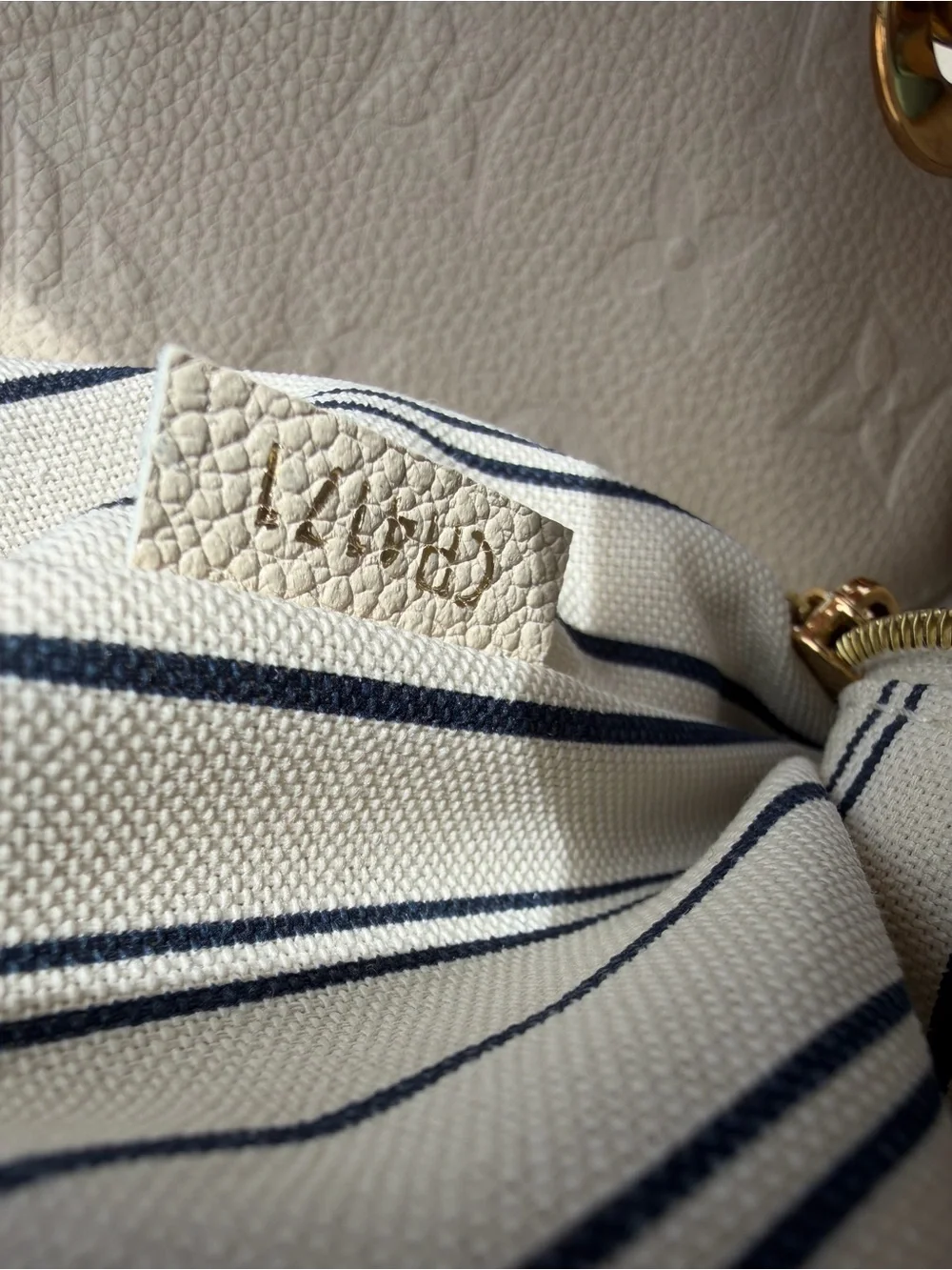 Authentic Louis Vuitton Cream Embossed Leather Hobo with Gold Hardware - Cream